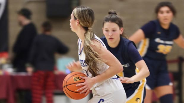 Mo Trigueiro white caruthers girls basketball by Daniel Jessing 2022