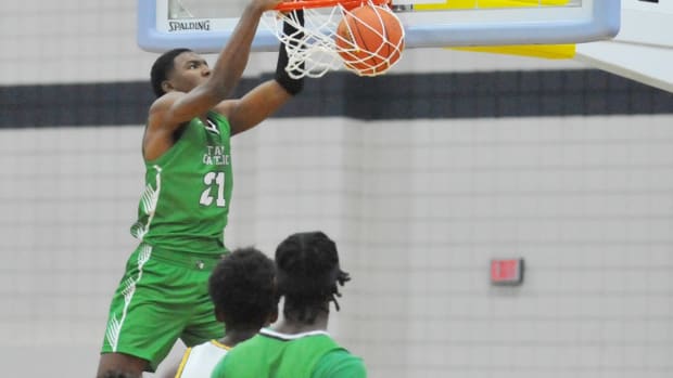 Tampa Catholic's Karter Knox throws down an alley-oop slam dunk.
