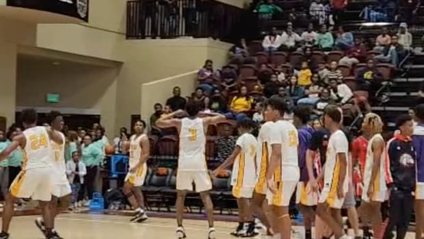 The Hattiesburg Boys basketball team celebrates following a quarterfinal win over Florence in the 2023 MHSAA Class 5A Basketball Playoffs at Pearl River Community College.