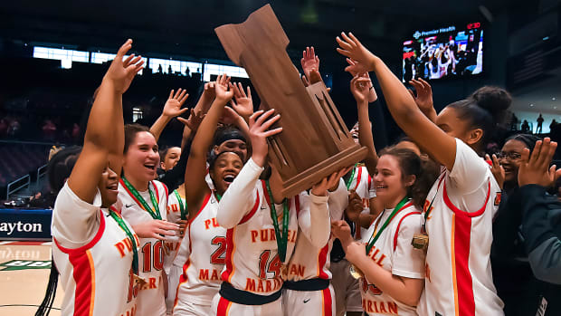 Purcell Marian celebrates winning the 2023 Division II state championship