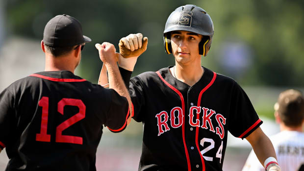 St. Stanislaus junior Jeremy Mares celebrates reaching base during the Rock-a-chaws' 7-3 win over Amory in Game 1 of the 2023 MHSAA Class 3A Baseball Championship series at Trustmark Park in Pearl, Miss.