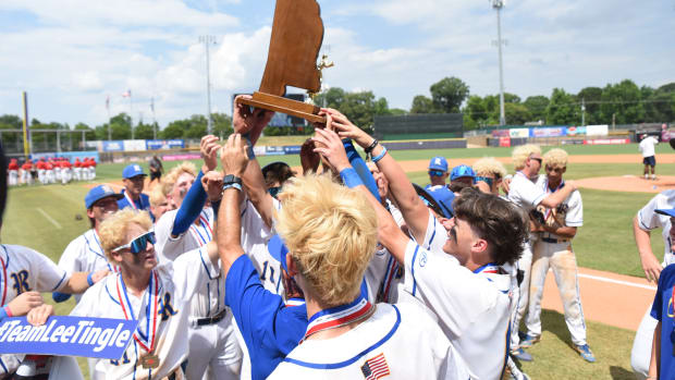 The Resurrection Catholic Eagles lift the 2023 MHSAA Class 1A State Championship Baseball Trophy after defeating West Union 10-1 at Trustmark Park in Pearl, Miss.