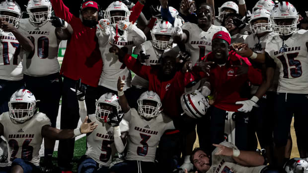 Chaminade-Madonna players and coaches celebrate after beating Buford (GA) 7-0 on September 17, 2021.