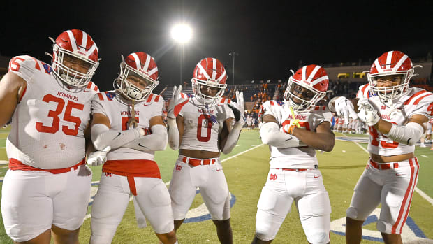 Mater Dei players celebrate after coming back to beat Bishop Gorman 24-21 on August 26.