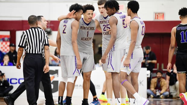 Middle Village, NY, USA; Montverde Academy Eagles guard Cade Cunningham (1) talks with teammates in the fourth quarter during a game against the IMG Academy Ascenders at Christ the King High School.