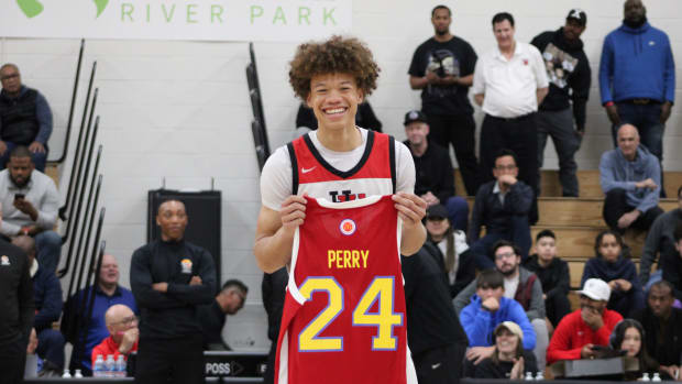 Trent Perry presented with 2024 McDonald's All-American jersey on Friday, Feb. 16, 2024.