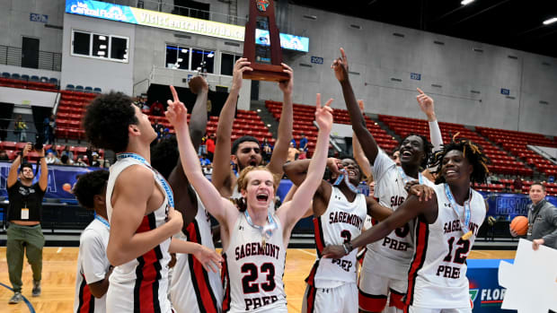 Sagemont basketball players celebrate after winning their second consecutive Class 2A state championship on Thursday at the RP Funding Center in Lakeland.