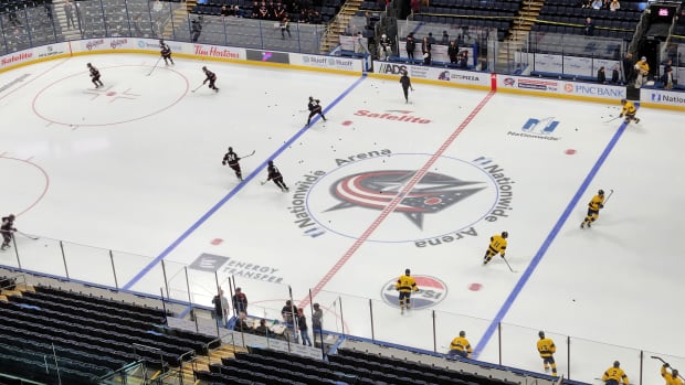 St. Ignatius and University School warm up at Nationwide Arena in Columbus prior to the 2024 OHSAA hockey state championship game.