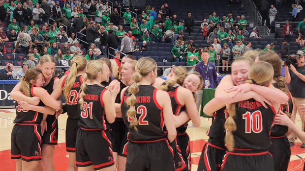 Fort Loramie players celebrate winning the 2024 OHSAA Division IV state championship game over Waterford.