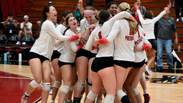 Carrollwood players celebrate winning the Class 3A state championship match on Thursday at the FHSAA girls volleyball state finals at Polk State College in Winter Haven.  