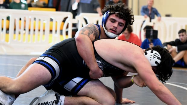 South Dade senior state champion Sawyer Bartelt picks up the semifinals win in a 215-pound match on Saturday at the FHSAA Duals wrestling state championships at Osceola High School. 