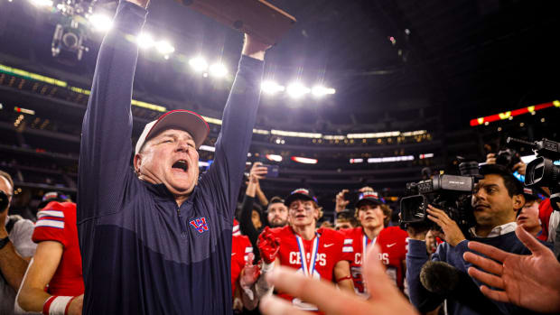 Westlake head coach Todd Dodge lifts the Class 6A Division 2 State Championship trophy after defeating Guyer 40-21 at AT&T Stadium in Arlington, Texas on Dec. 18, 2021. Aem Westlake Vs Guyer 6