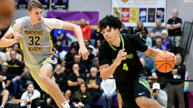 Prolific Prep sophomore guard Tyran Strokes drives to the basket while Montverde Academy senior Cooper Flagg (32) defends during the MAIT championship game on Jan. 27, 2024.
