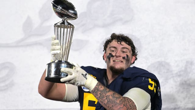 Michigan sophomore defensive lineman Mason Graham celebrates after winning the Rose Bowl. Graham was a standout at Servite High in Southern California.