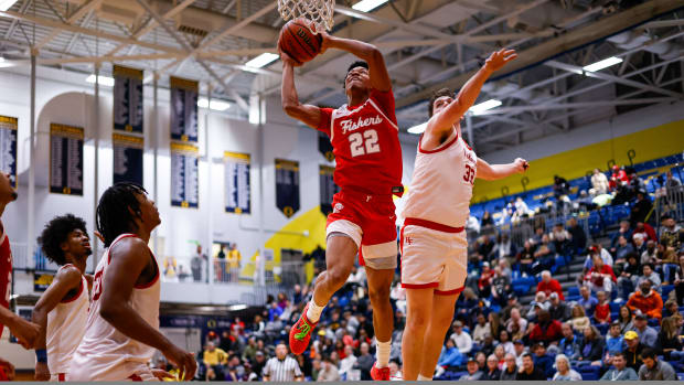 Fishers (Indiana) junior JonAnthony Hall soars for a dunk