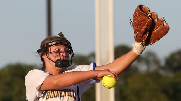Booneville High School's Hallie Burns (24) releases a pitch. Booneville and Raleigh played in game one of the MHSAA Class 3A Baseball Championship at Mississippi State University on Wednesday, May 12, 2021. Photo by Keith Warren