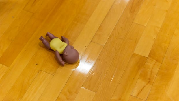 A kewpie doll on the basketball court has serious historical relevance at Columbia Hickman.