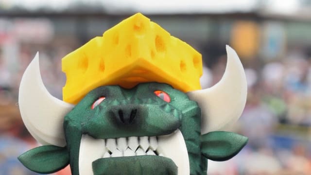 A Hodag still manages to look fierce with cheese on its head.