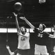 WIAA Assistant Executive Director Cindy Adsit (left) goes up for a layup playing for Montana State's women's basketball program in the 1970s.