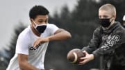 What lies ahead for face-covered WIAA football? Delaware and Michigan high school programs know the drill