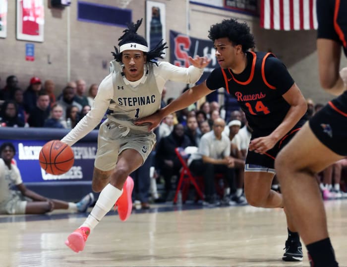 Stepinac's Boogie Fland (1) drives to the basket against St. Raymonds during CHSAA basketball action at Archbishop Stepinac High School in White Plains Jan. 19, 2024. Stepinac won the game 100-71.