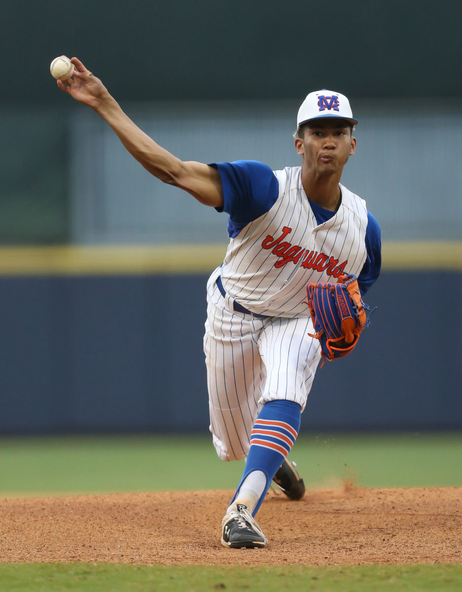 Madison Central's Braden Montgomery (6) releases a pitch in the first inning. Madison Central and Northwest Rankin played in game 1 of the MHSAA Class 6A Baseball Championship on Thursday, June 4, 2021 at Trustmark Park. Photo by Keith Warren