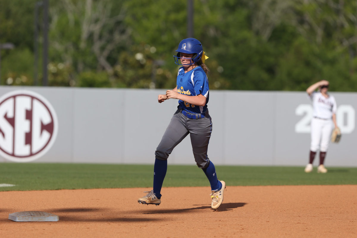 Booneville High School's Olivia Garrett (27) rounds second base after hitting a home run. Booneville and Raleigh played in game two of the MHSAA Class 3A Baseball Championship at Mississippi State University on Thursday, May 13, 2021. Photo by Keith Warren