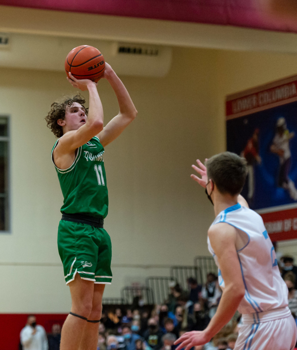 Tumwater's Luke Brewer shoots a jumper in a Lower Columbia College's Martin Luther King Jr. Tribute game on Monday, Jan. 17, 2022, at Myklebust Gymnasium in Longview. Tumwater won 64-52 over Mark Morris. (Joshua Hart/For ScorebookLive)