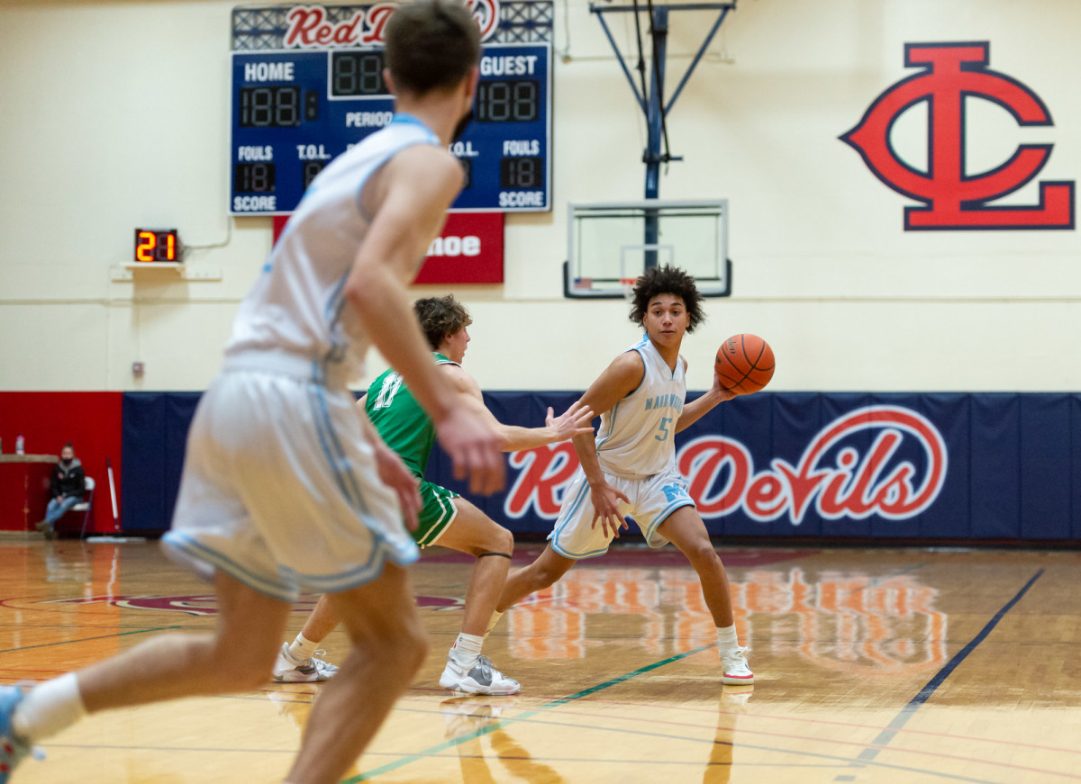 Mark Morris' Kobe Parlin looks for a pass in a Lower Columbia College's Martin Luther King Jr. Tribute game on Monday, Jan. 17, 2022, at Myklebust Gymnasium in Longview. Tumwater won 64-52 over Mark Morris. (Joshua Hart/For ScorebookLive)