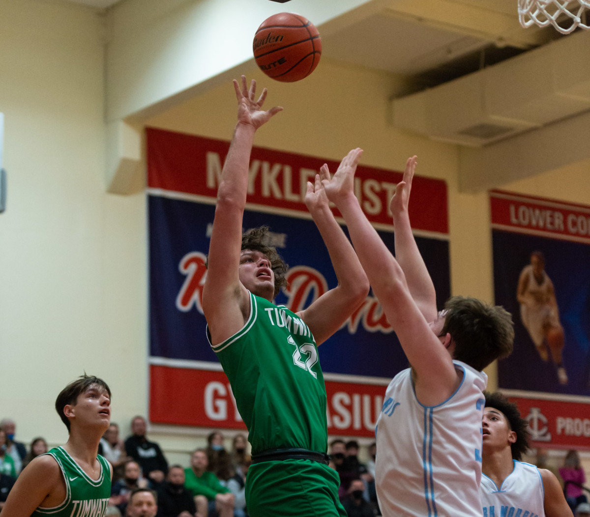 Tumwater's Ryan Otton shoots in a Lower Columbia College's Martin Luther King Jr. Tribute game on Monday, Jan. 17, 2022, at Myklebust Gymnasium in Longview. Tumwater won 64-52 over Mark Morris. (Joshua Hart/For ScorebookLive)