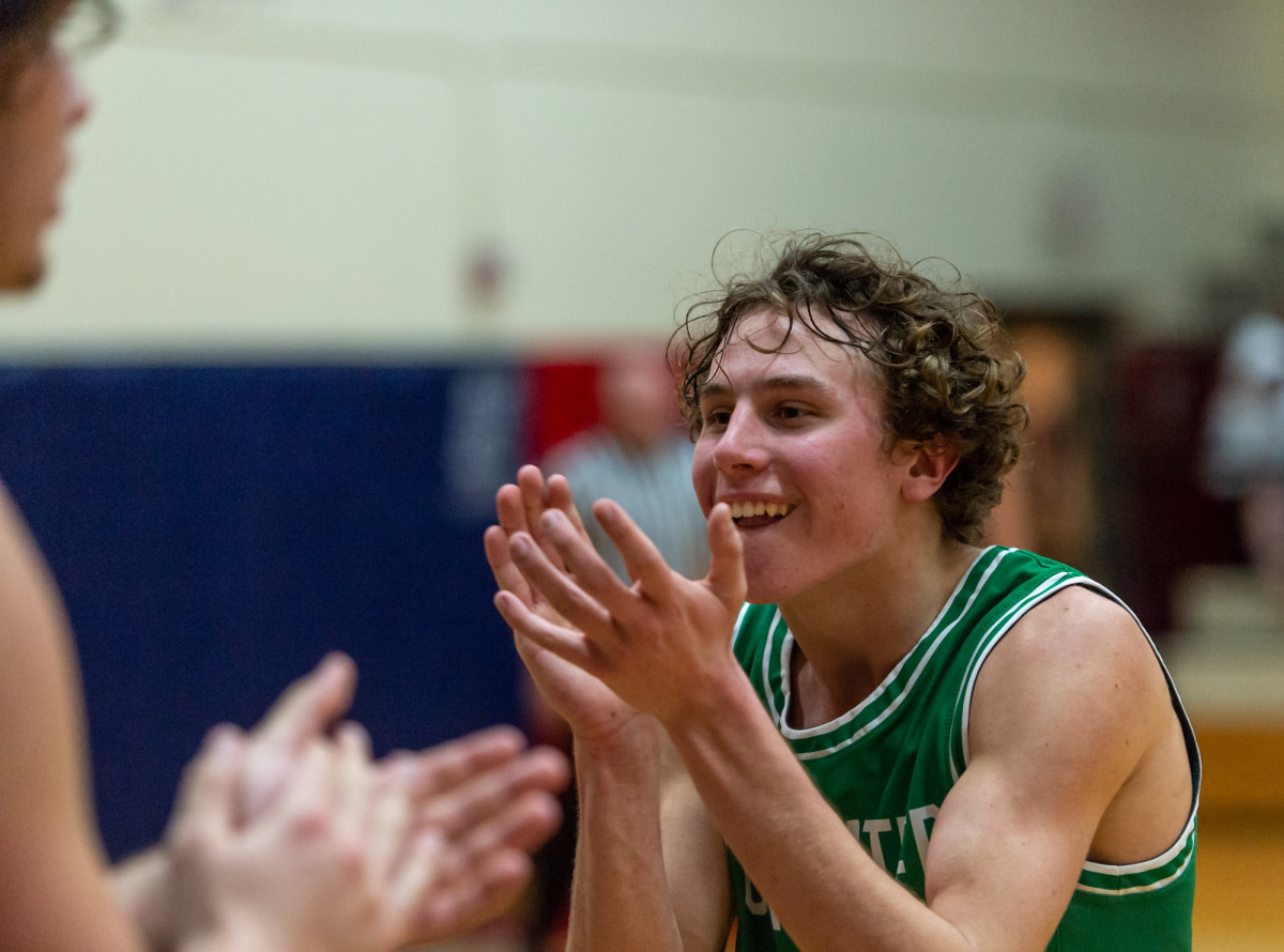 Tumwater's Luke Brewer celebrates victory in a Lower Columbia College's Martin Luther King Jr. Tribute game on Monday, Jan. 17, 2022, at Myklebust Gymnasium in Longview. Tumwater won 64-52 over Mark Morris. (Joshua Hart/For ScorebookLive)