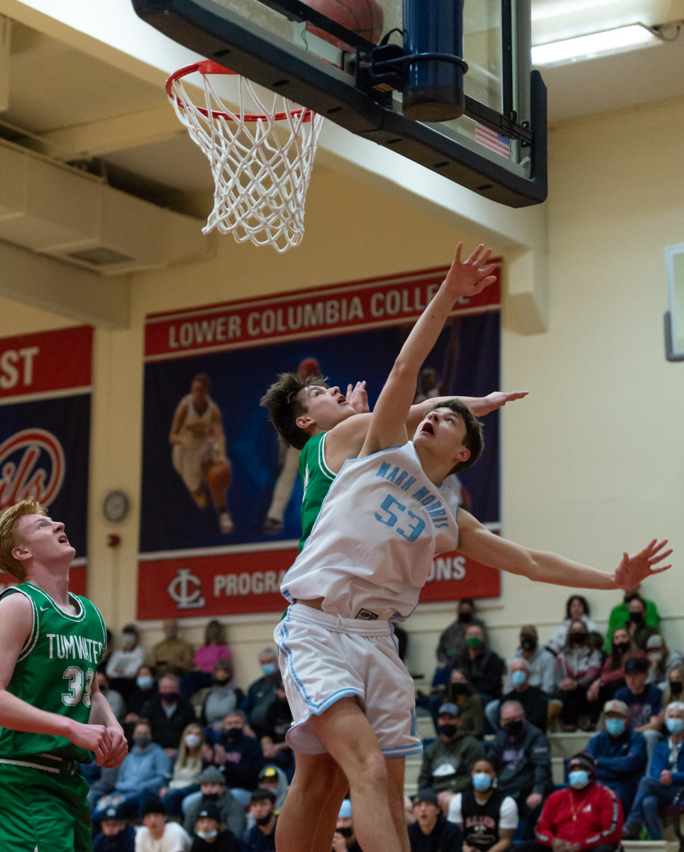 Mark Morris' Jacob Hammond looks at his layup as it rims out in a Lower Columbia College's Martin Luther King Jr. Tribute game on Monday, Jan. 17, 2022, at Myklebust Gymnasium in Longview. Tumwater won 64-52 over Mark Morris. (Joshua Hart/For ScorebookLive)