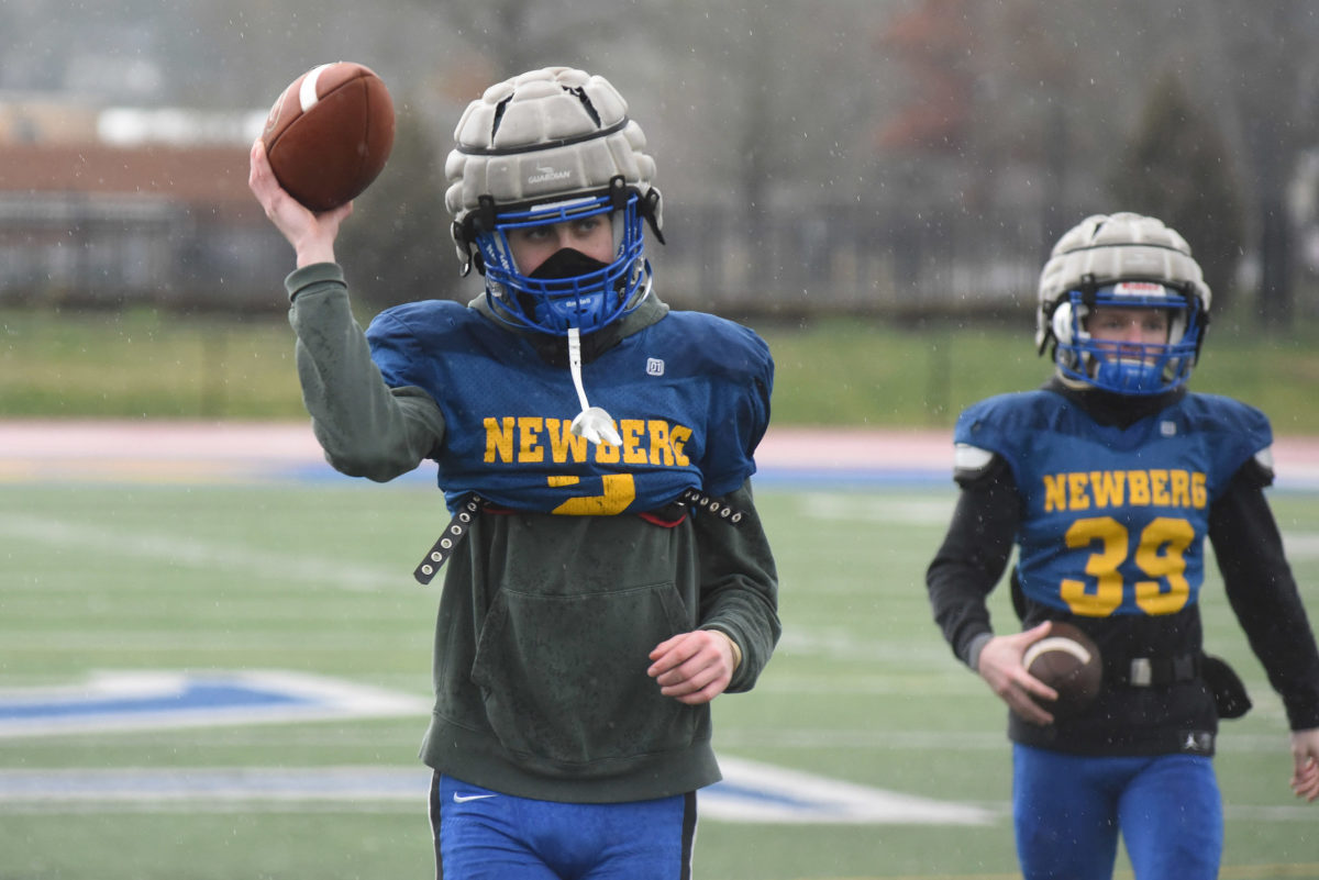 The Newberg Tigers football team practices Friday, Feb. 19, 2020 in Newberg, Ore.