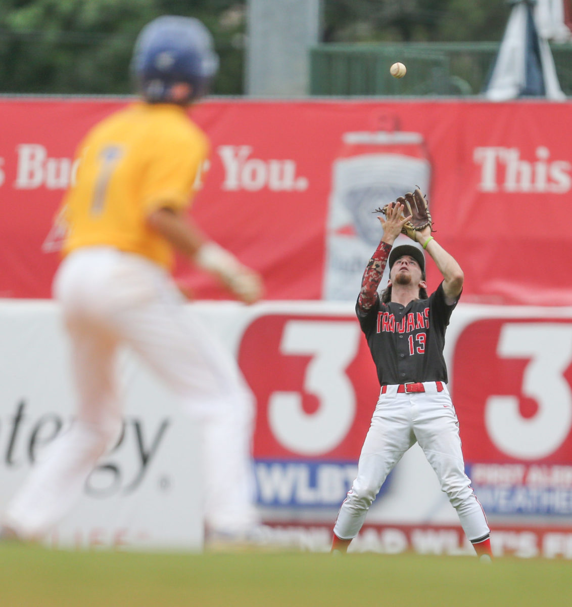 Magee's Matthew Russell (13) catches a fly ball in right field. Booneville and Magee played in game 1 of the MHSAA Class 3A Baseball Championship on Tuesday, June 1, 2021 at Trustmark Park. Photo by Keith Warren