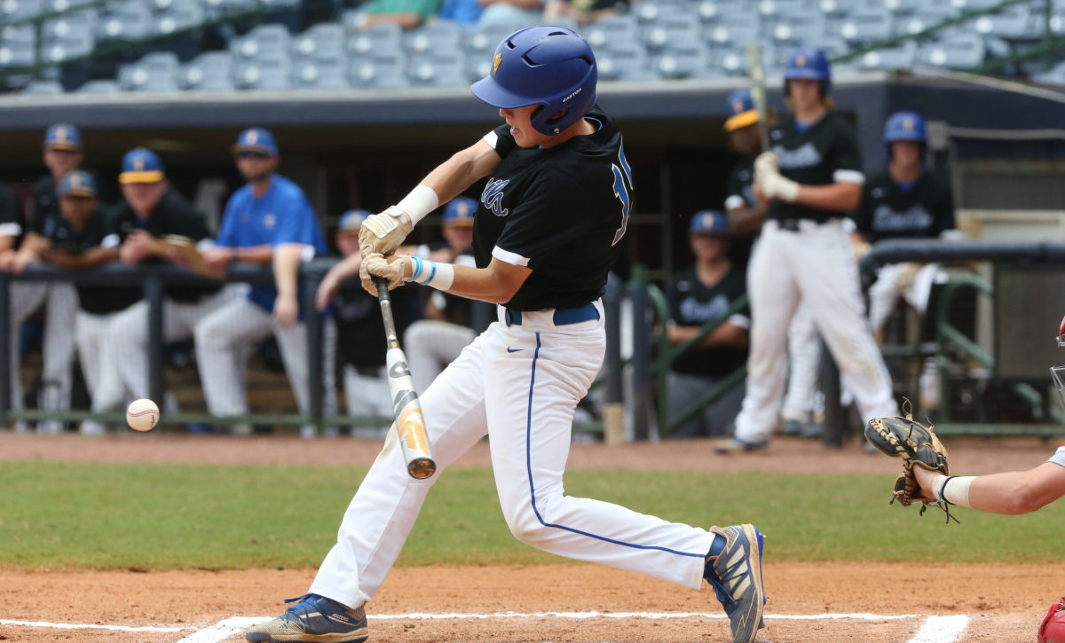 Booneville's Ben Sandlin (15) makes contact with the ball. Booneville and Magee played in game 3 of the MHSAA Class 3A Baseball Championship on Saturday, June 5, 2021 at Trustmark Park. Photo by Keith Warren
