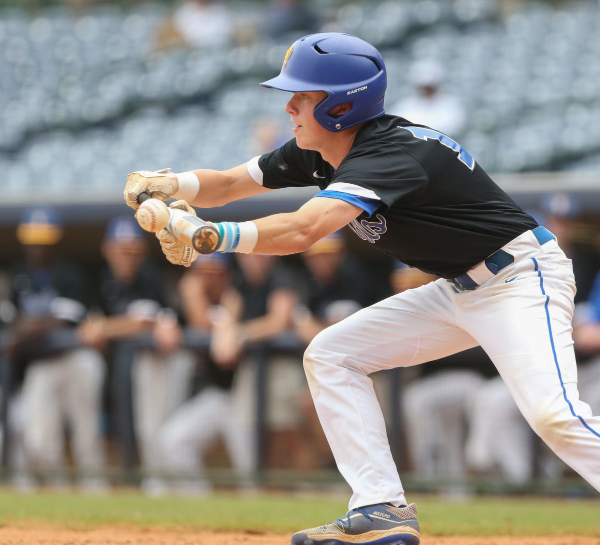 Booneville's Ben Sandlin (15) bunts. Booneville and Magee played in game 3 of the MHSAA Class 3A Baseball Championship on Saturday, June 5, 2021 at Trustmark Park. Photo by Keith Warren