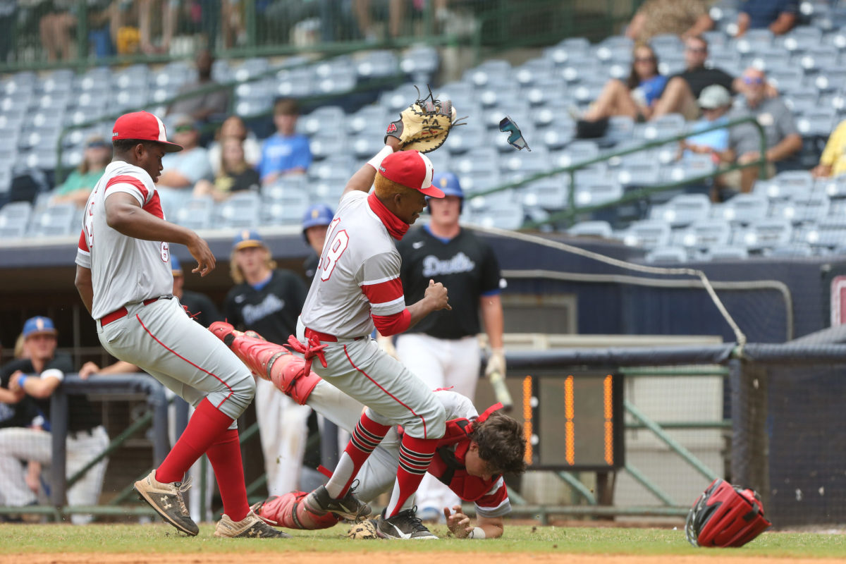 Magee's Chance Magee (18) and Magee's Banks Teater (3) collide while trying to catch a foul ball. Booneville and Magee played in game 3 of the MHSAA Class 3A Baseball Championship on Saturday, June 5, 2021 at Trustmark Park. Photo by Keith Warren