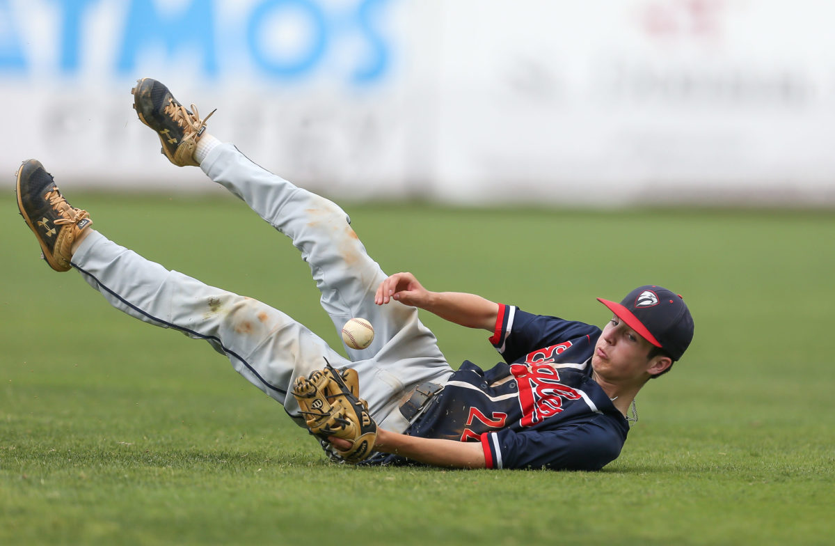 Tupelo Christian's Logan White (22) attempts to field a ground ball at second. Tupelo Christian and Resurrection played in game 2 of the MHSAA Class 1A Baseball Championship on Thursday, June 3, 2021 at Trustmark Park. Photo by Keith Warren