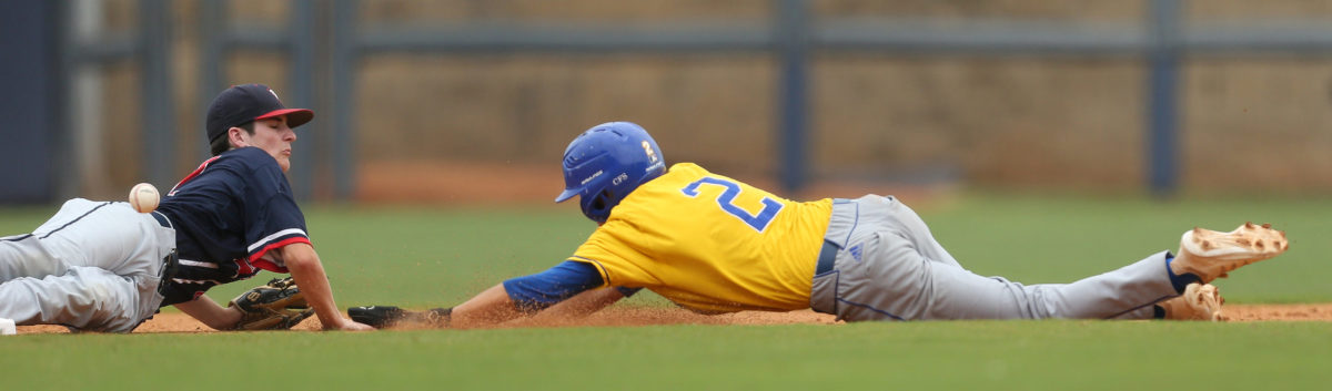Resurrection's Max Askew (2) slides into second base. Tupelo Christian and Resurrection played in game 2 of the MHSAA Class 1A Baseball Championship on Thursday, June 3, 2021 at Trustmark Park. Photo by Keith Warren