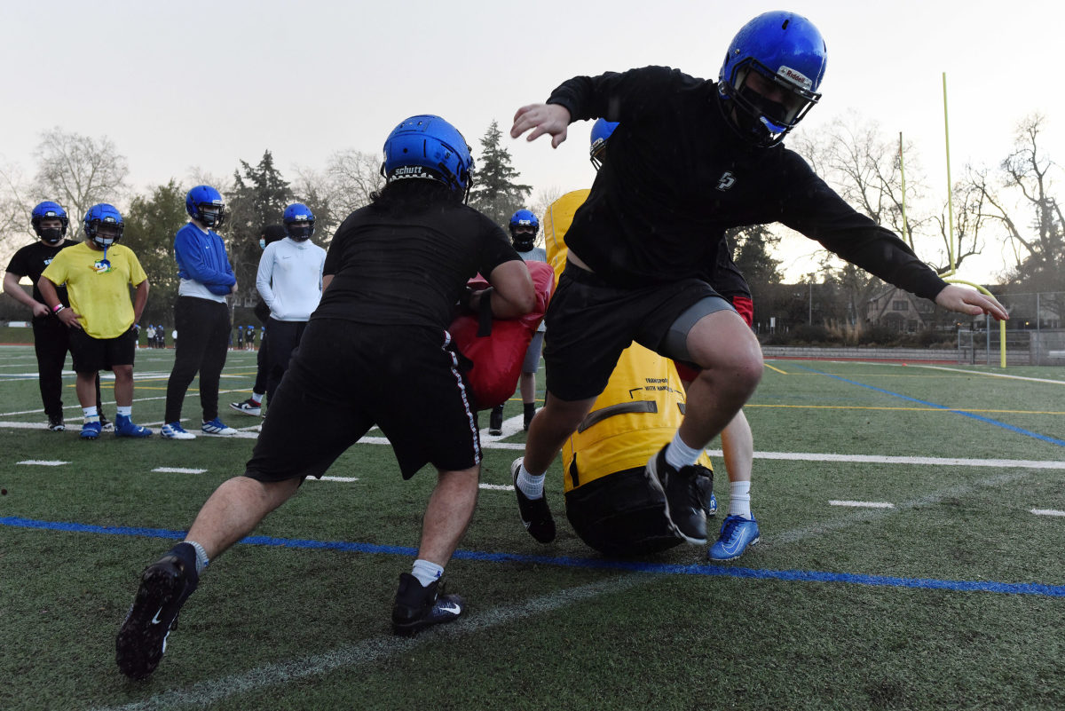 The Grant High School football team practices Tuesday, Feb. 23, 2021 in Portland, Ore.