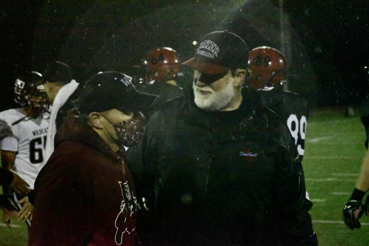 Mount Baker's Ron Lepper congratulates his protege, Toppenish's Jason Smith, post-game (Photo by Andy Buhler)