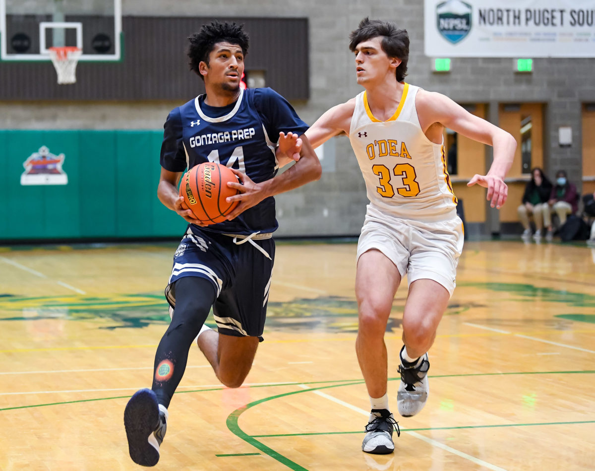 Gonzaga Prep's Jayden Stevens, a first-team all-GSL selection and recent Oregon State commit, drives against an O'Dea defender during the Hardwood Invite.