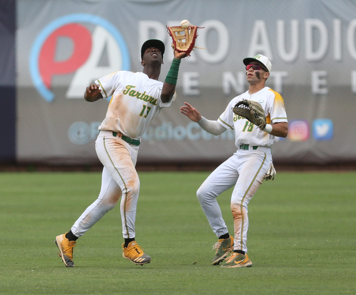 Taylorsville's Ty Keyes (13) and Taylorsville's Kelby Jordan (18) close in on a fly ball. East Union and Taylorsville played in game 2 of the MHSAA Class 2A Baseball Championship on Friday, June 4, 2021 at Trustmark Park. Photo by Keith Warren