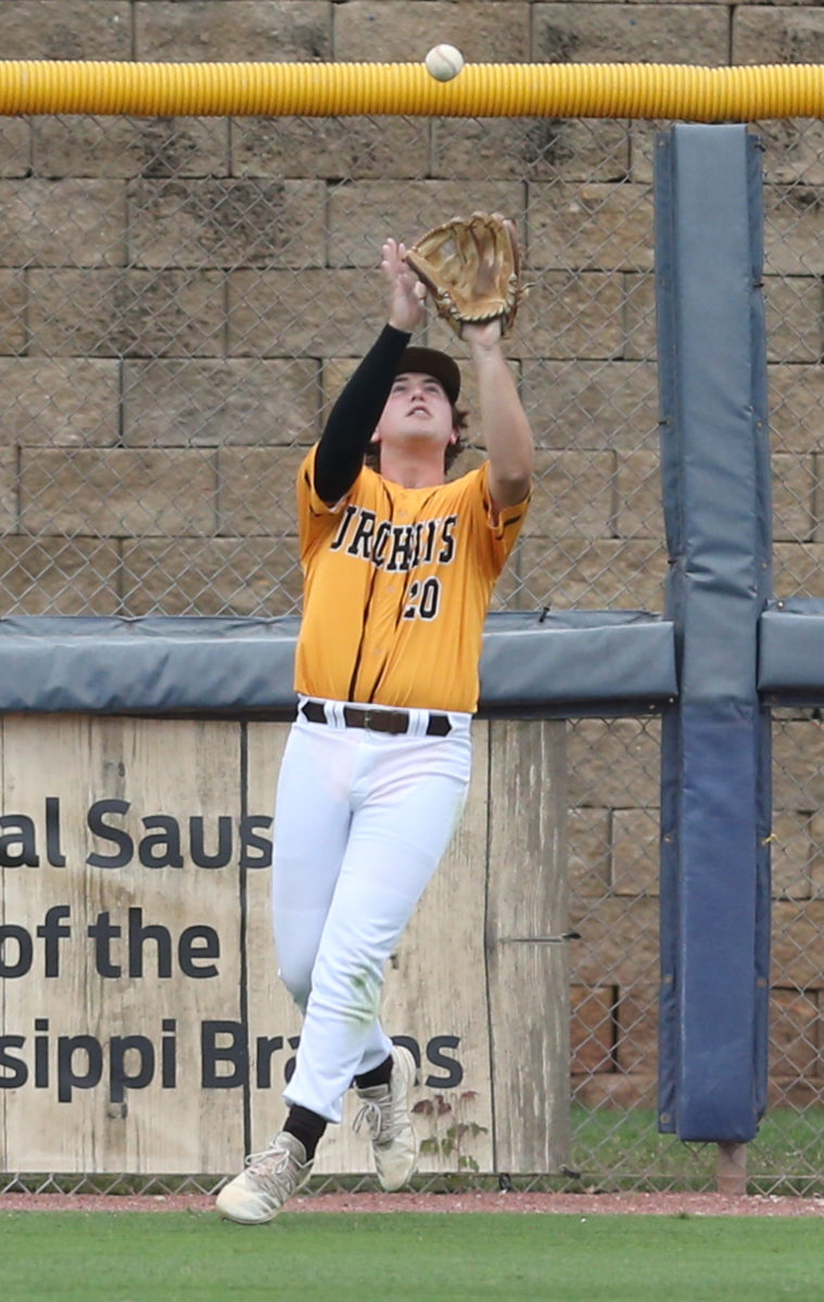 East Union's Jace Basil (20) catches a fly ball in right field. East Union and Taylorsville played in game 2 of the MHSAA Class 2A Baseball Championship on Friday, June 4, 2021 at Trustmark Park. Photo by Keith Warren
