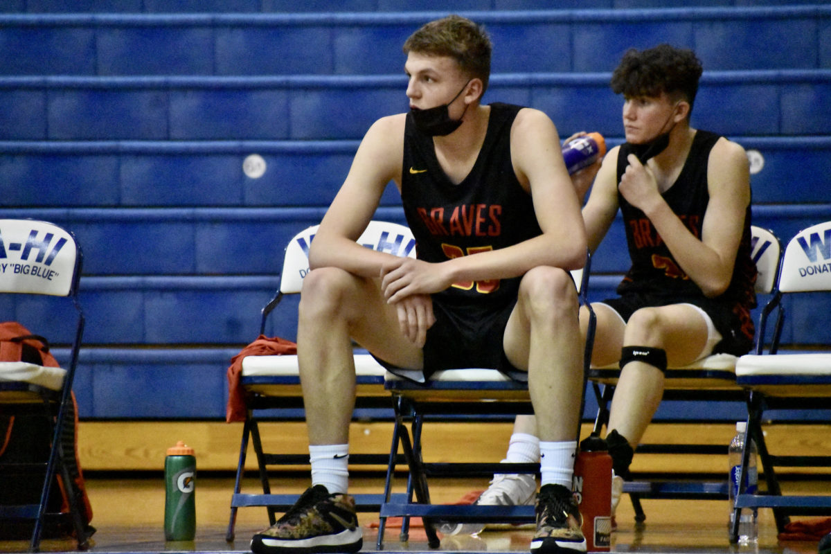 Bilodeau catches his breath warming up to play Walla Walla in May 2021, his junior year. He's grown four inches and around 25 pounds in the last 14 months. (Photo by Andy Buhler)