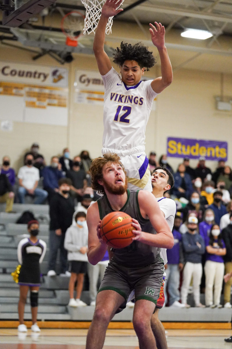 Dunning catches a North Kitsap defender with a pump-fake in a regular showdown with its league foe.