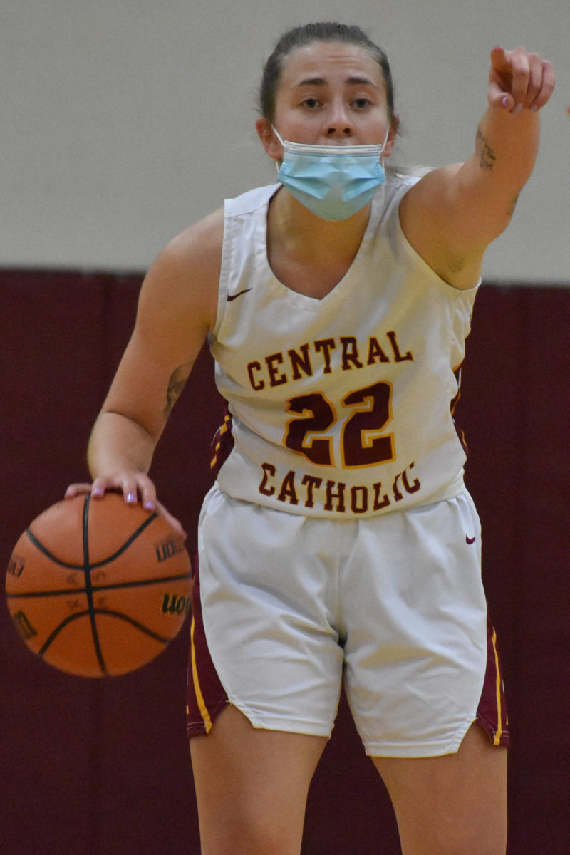 Central Catholic's Gretta Baker directs traffic from the point.
