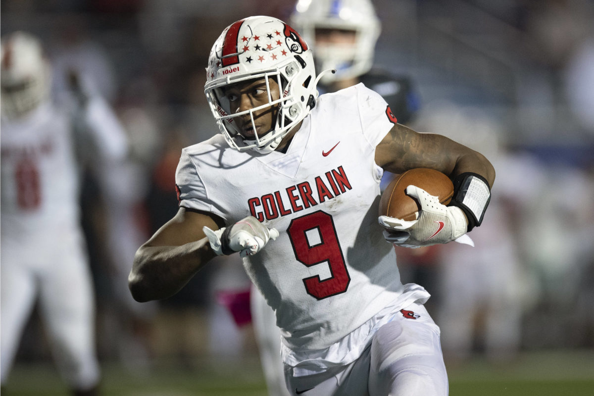 Week 8: Colerain's MJ Flowers is determined to find running room, or to run somebody over, against Hamilton. (Photo by Ben Jackson)