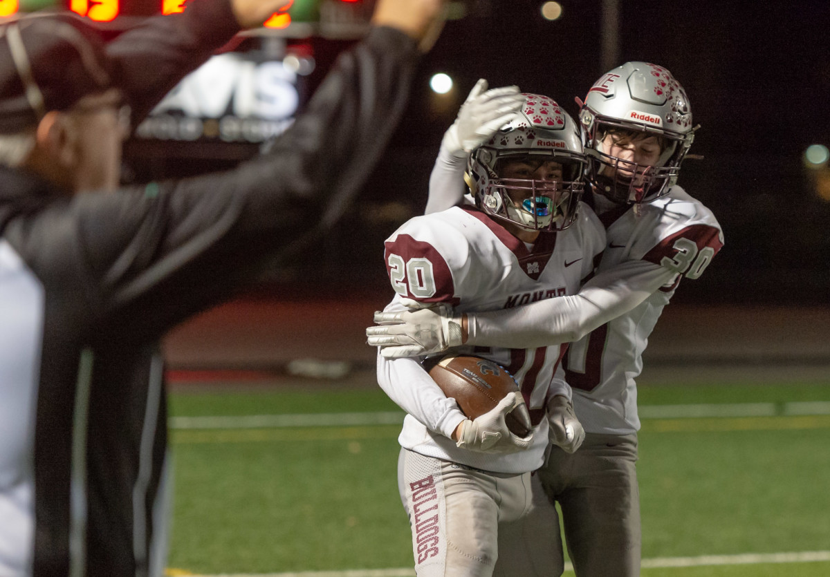 Montesano's Konnor Odekirk and Kaleb Ames celebrate a fumble recovery in a 1A Southwest District playoff game on Friday, Nov. 5, 2021, at Beaver Stadium in Woodland. Montesano won 42-20. (Joshua Hart/For ScorebookLive)