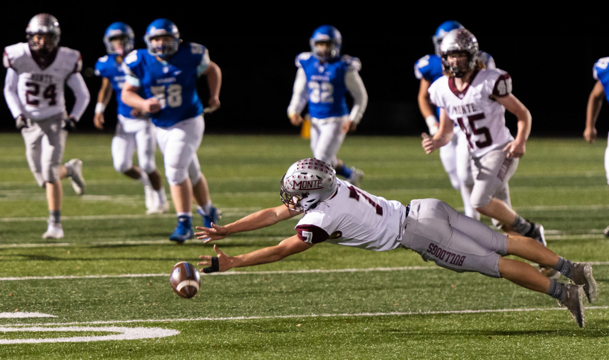 Montesano's Ethan Blundred dives for a possible interception in a 1A Southwest District playoff game on Friday, Nov. 5, 2021, at Beaver Stadium in Woodland. Montesano won 42-20. (Joshua Hart/For ScorebookLive)